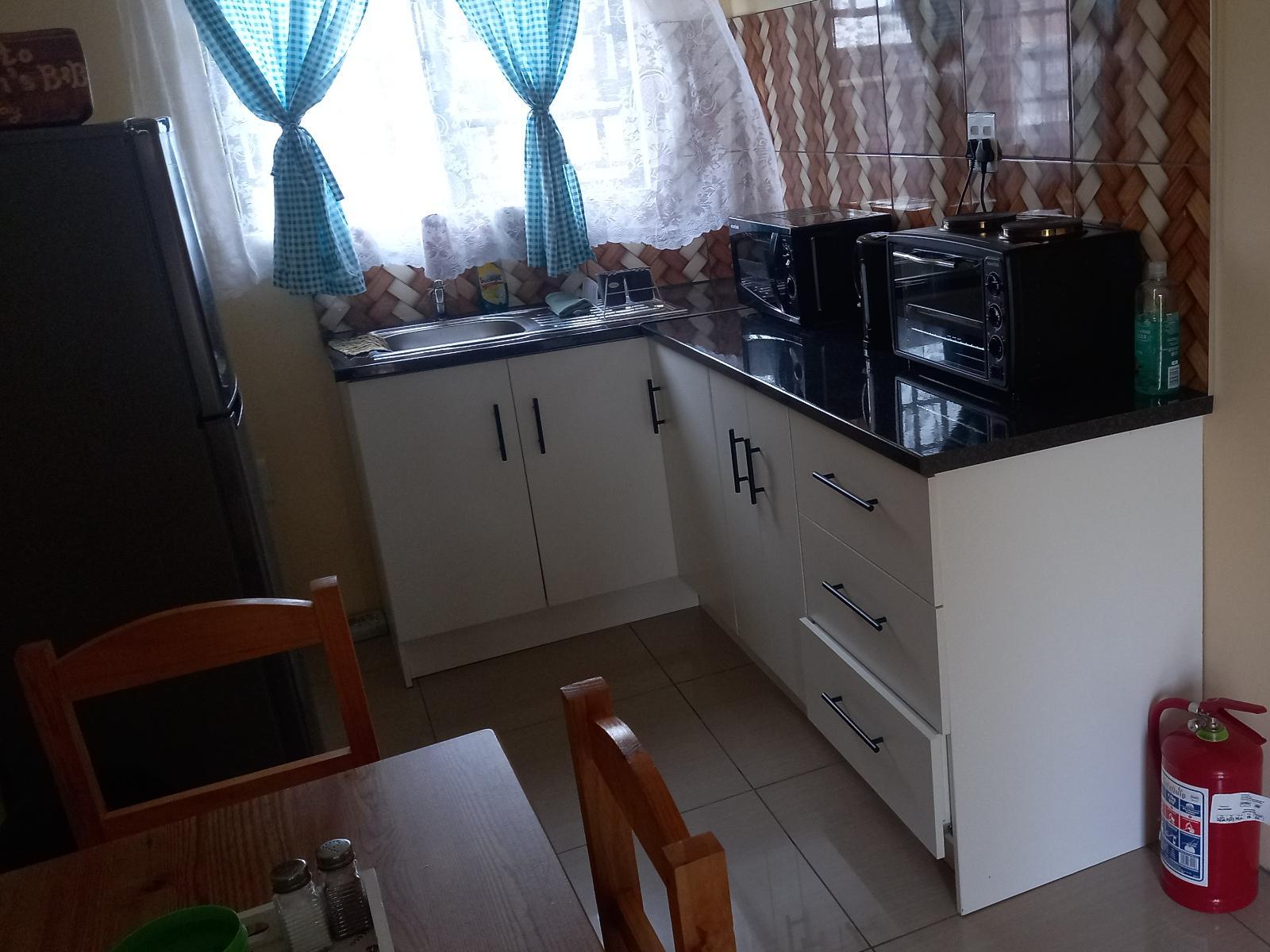 Room 1 — Kitchenette