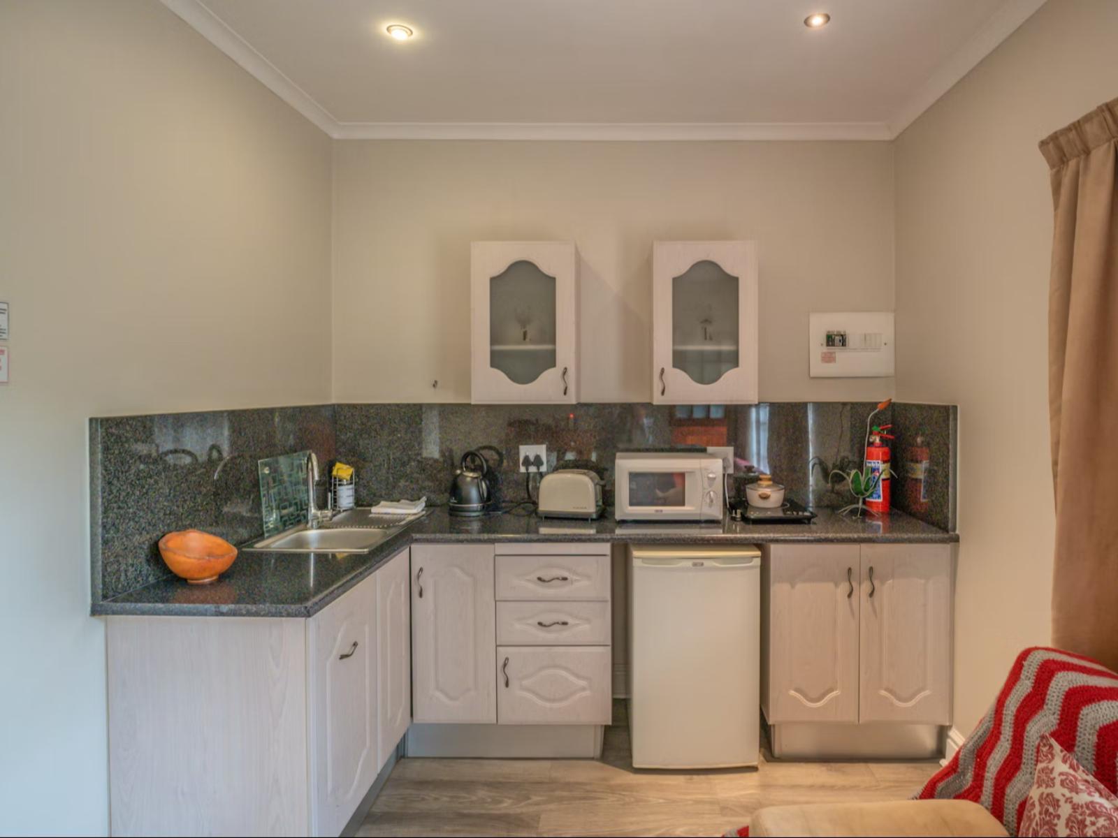 Room 1 — Kitchenette