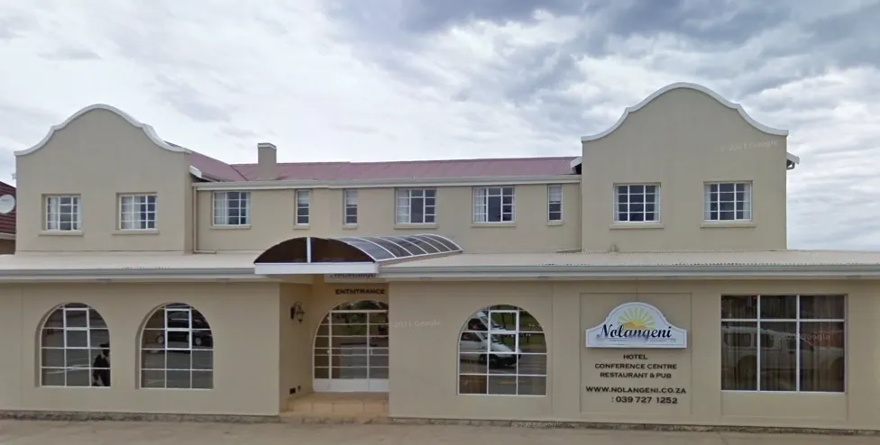 Twostory building with arched windows and a sign for Jabulani conference centre