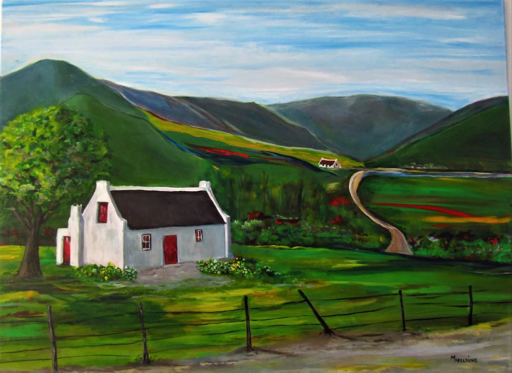 A white cottage with a red door in a green valley with hills