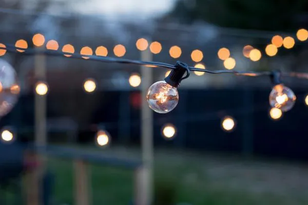 String lights glowing in the evening outdoors