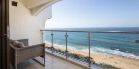 Balcony with ocean view beach and blue sky