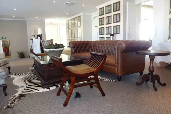 Leather sofa wooden chair and coffee table in a modern living room