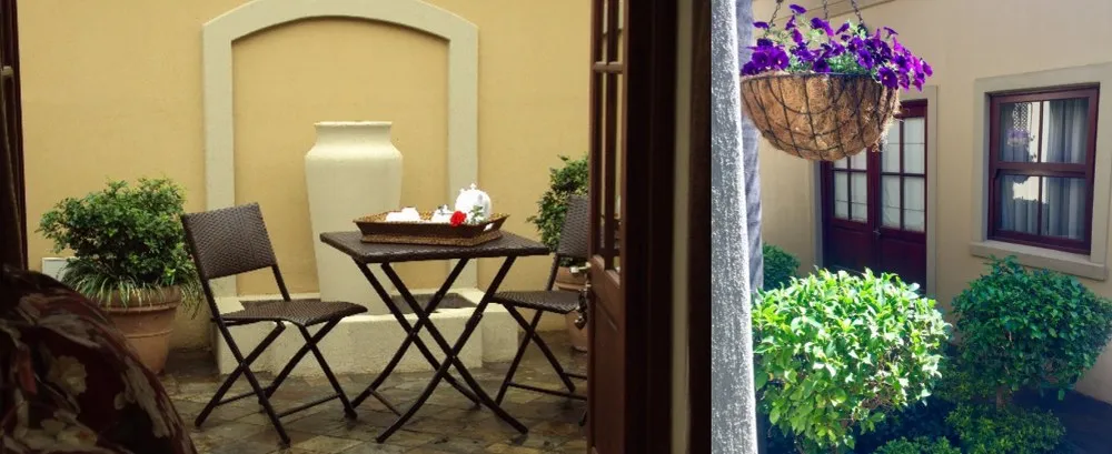 Two outdoor seating areas with plants and a hanging flower basket