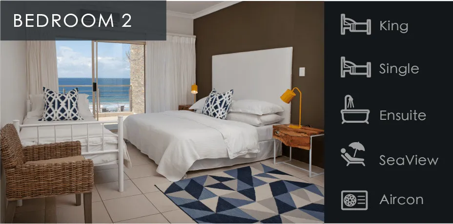 Bedroom with king and single beds ocean view ensuite sea view and aircon