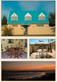 House with blue roof dining area and sunset view over water