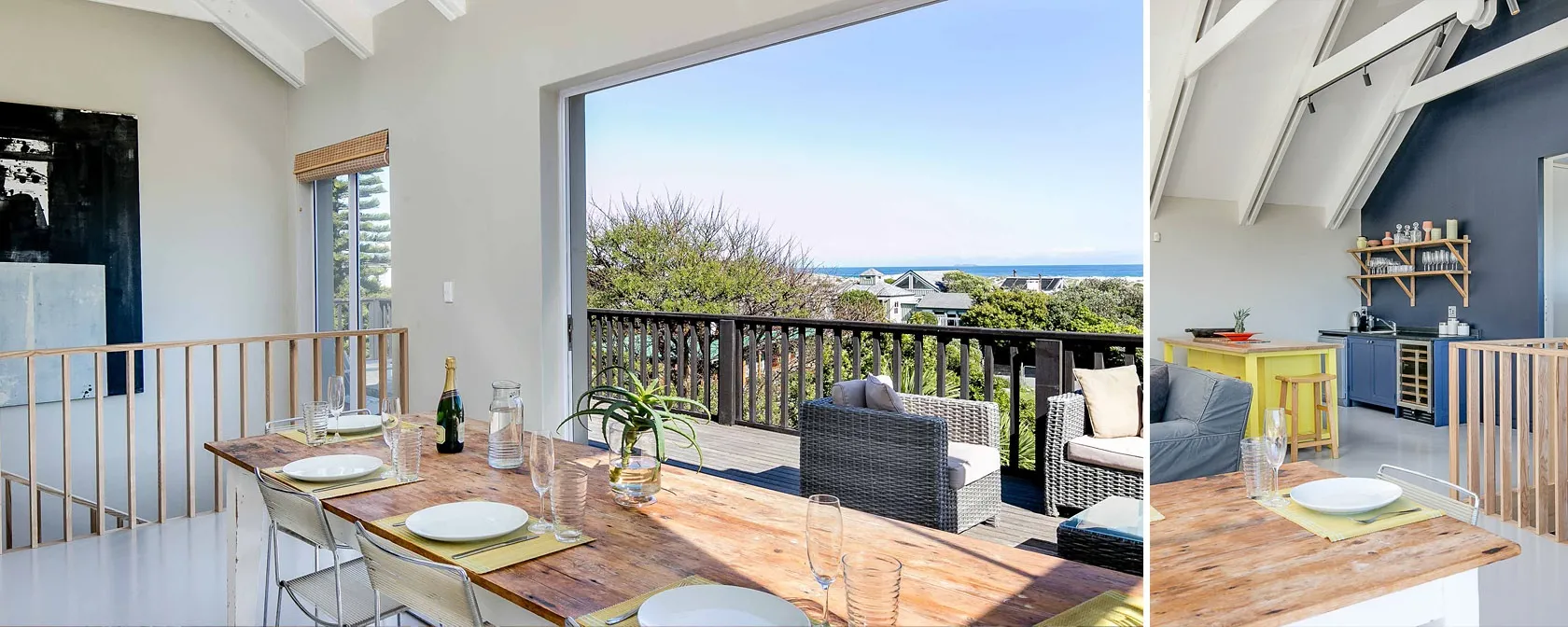 Dining area with ocean view outdoor seating and kitchenette in background